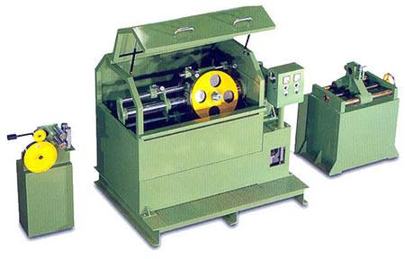 Photo of a Eccentric Taping Head Machine